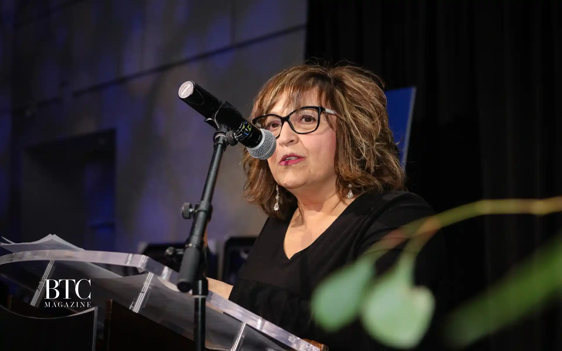 Elvira Caria in broadcast studio quiet power