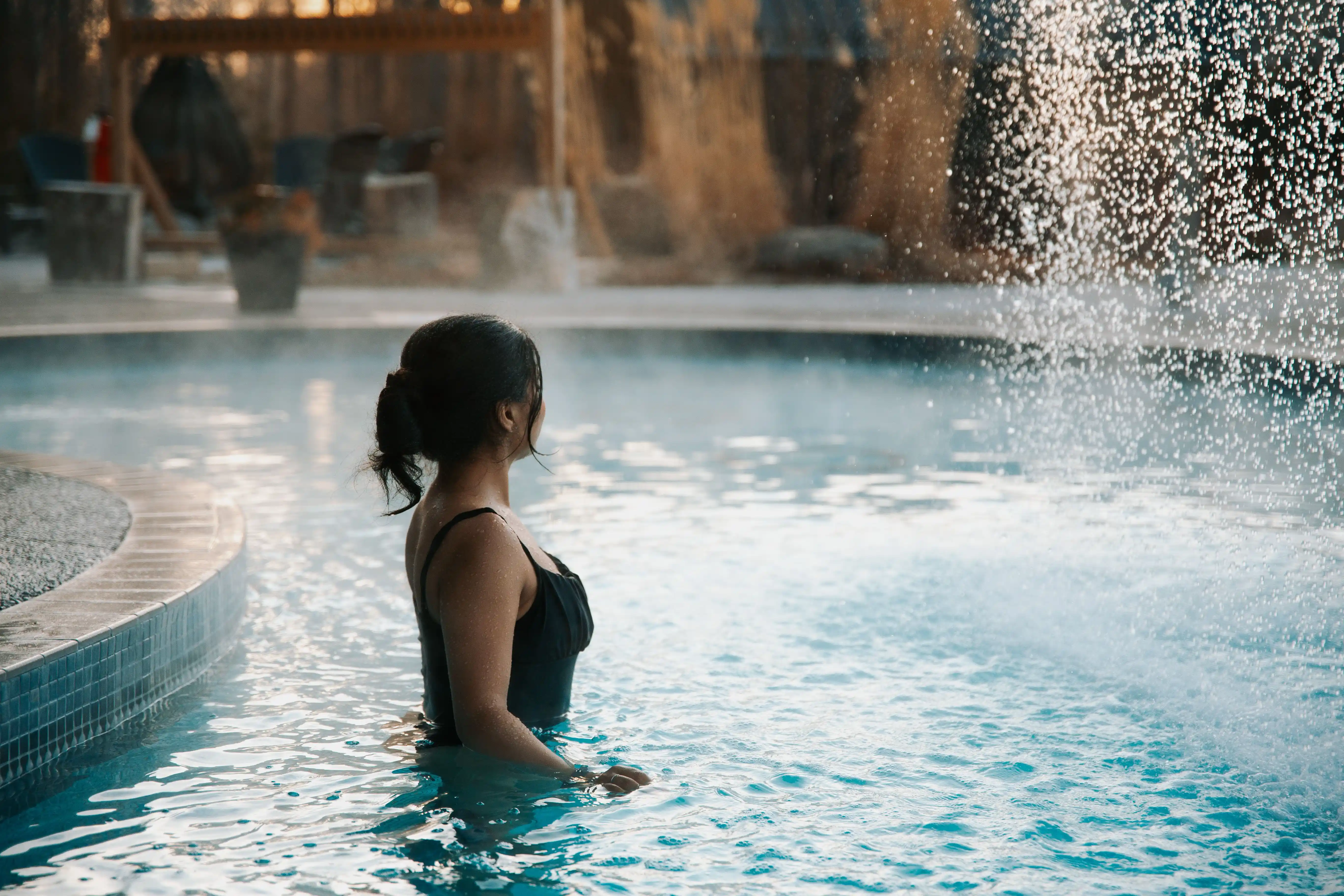 Steam rising from outdoor hot tub Nordic spa